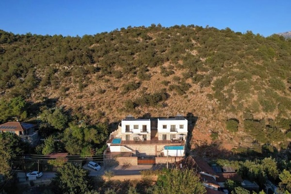 Left villa has two private balconies.Right villa has one private balcony.