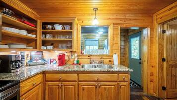 Cabin, Multiple Beds, Hot Tub (Sunset Ridge) | Private kitchen | Fridge, microwave, oven, stovetop