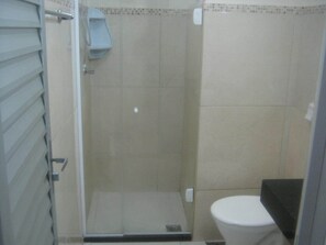 Shower, towels, soap, toilet paper