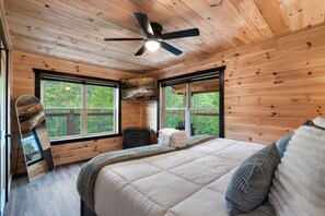 The second floor offers another spacious king suite with a private ensuite bath and mountain views right outside the window. - Cabin for 12 | 2 Kitchens & Game Rooms (Pigeon Forge)