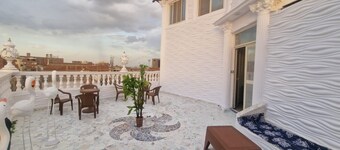 Comfortable 4-Bedroom Apartment with Spacious Terrace
