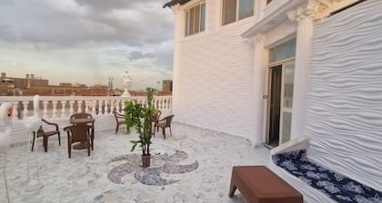 Comfortable 4-Bedroom Apartment with Spacious Terrace
