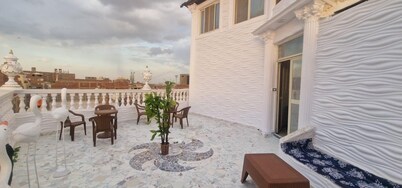 Comfortable 4-Bedroom Apartment with Spacious Terrace