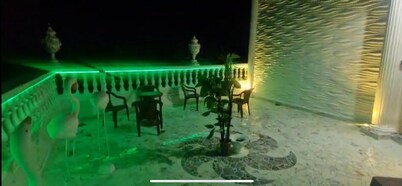 Comfortable 4-Bedroom Apartment with Spacious Terrace
