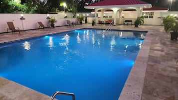 Outdoor pool, open 7:00 AM to 7:00 PM, free pool cabanas, pool loungers