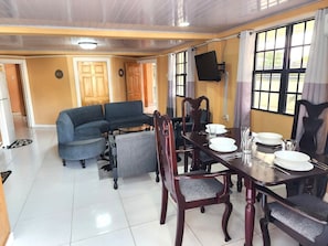 Luxury Apartment, 3 Bedrooms, Patio, Courtyard View | Living area | 42-inch Smart TV with digital channels