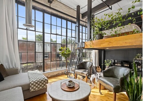 Midcentury Modern loft in Castleberry Hill with patio, parking & sleek updates.