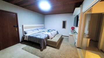 Deluxe Studio Suite, Balcony, Garden View | Blackout drapes, iron/ironing board, free WiFi