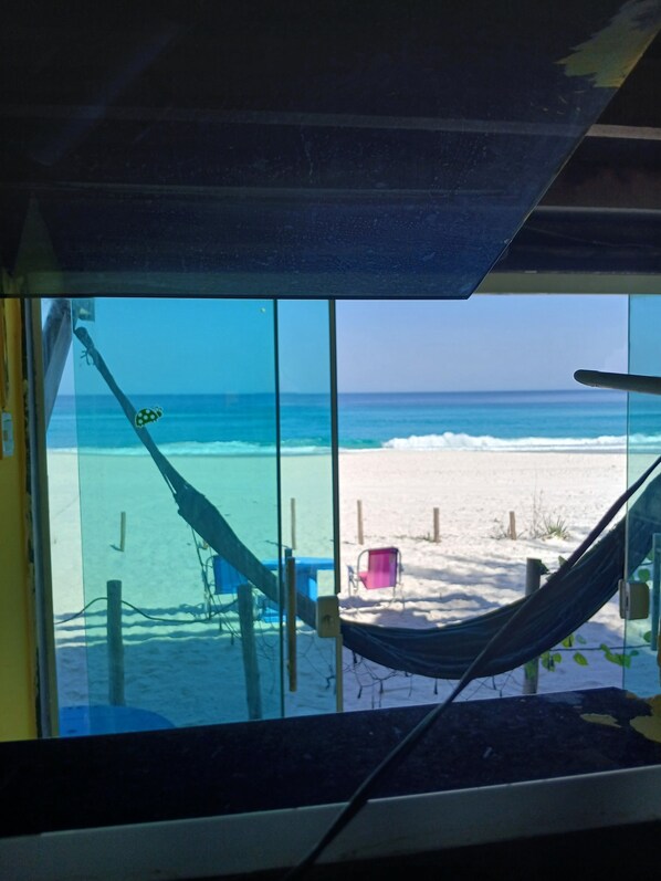 On the beach, sun-loungers