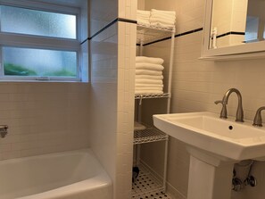 Hair dryer, towels, soap, toilet paper