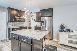 Fridge, microwave, dishwasher, coffee/tea maker