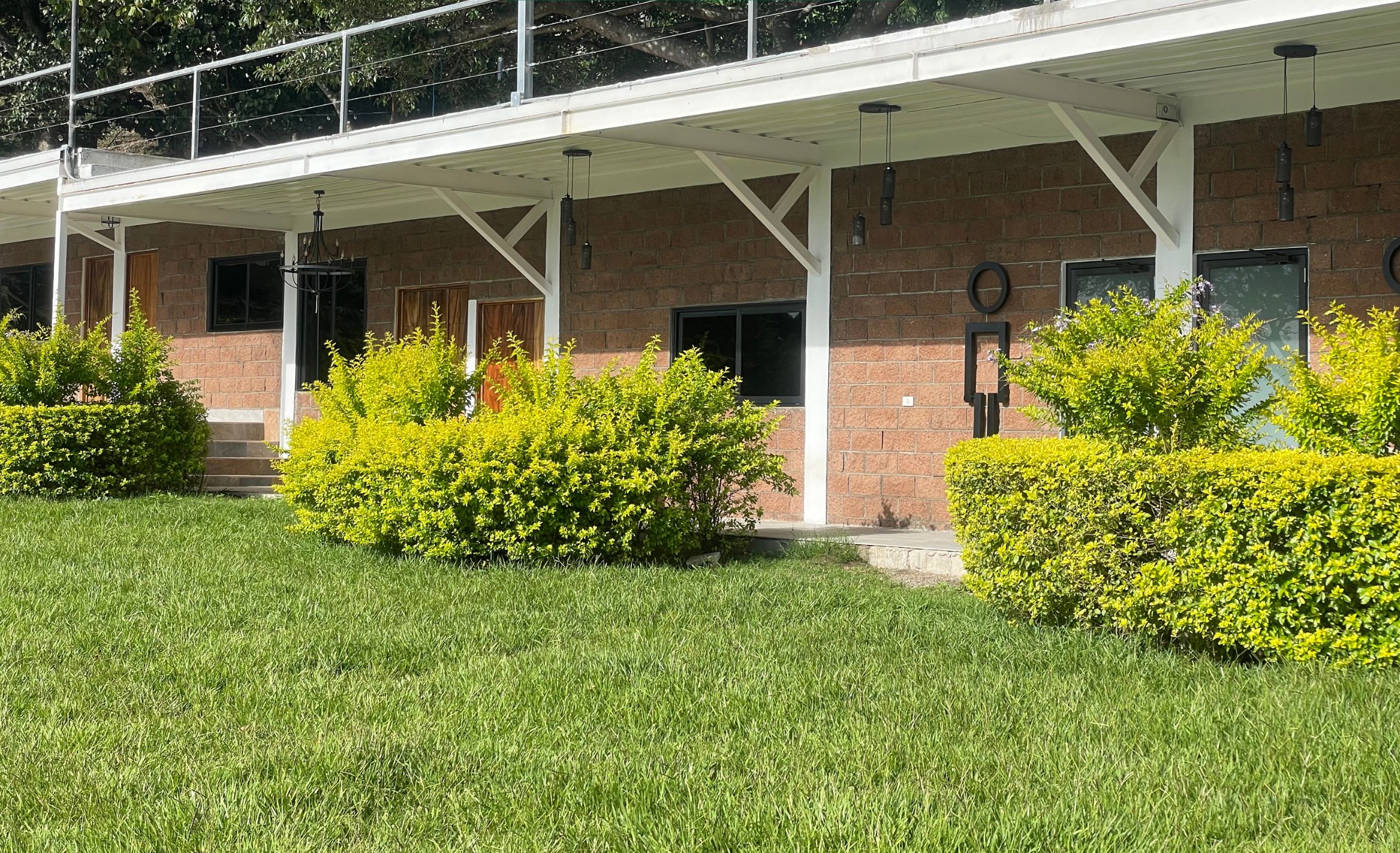 A building with a sign reading "Double Room with Nature View."