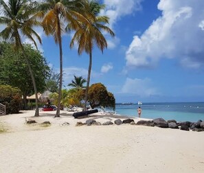 On the beach, sun loungers