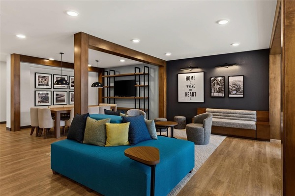 Unwind on plush seating with cozy lighting and modern décor.