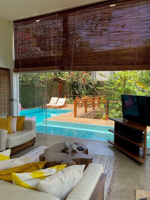 Basic Villa | Living area | Flat-screen TV