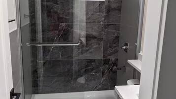 Shower, towels, soap, shampoo