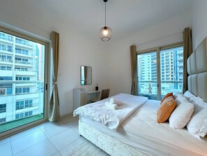 1 bedroom, desk, iron/ironing board, travel crib