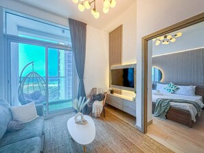 1 bedroom, desk, iron/ironing board, travel crib