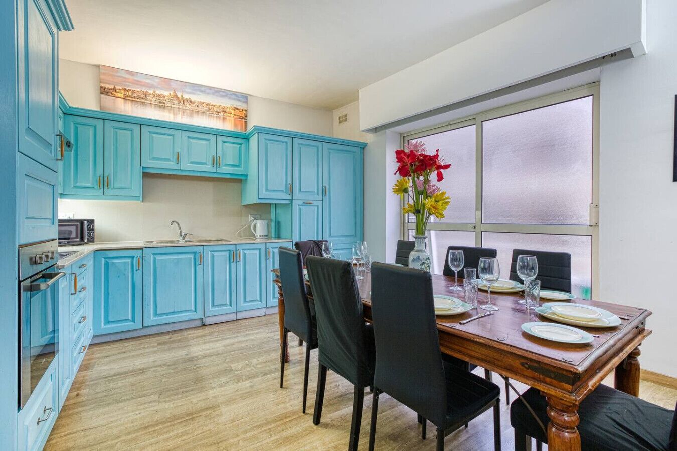 Microwave, oven, dishwasher, dining tables