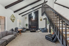 Smart TV, fireplace, books
