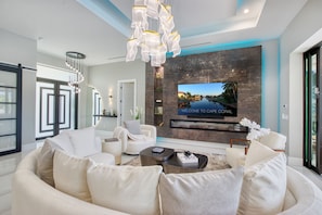 Smart TV, fireplace, books, stereo