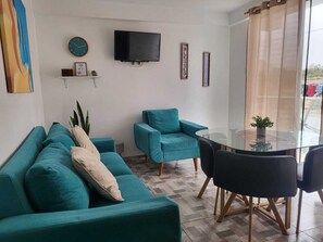 Family Apartment, Balcony, City View | In-room dining