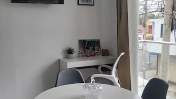 Family Apartment, Balcony, City View | In-room dining