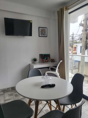 Family Apartment, Balcony, City View | In-room dining