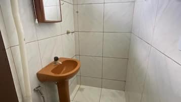 Shower, towels, soap, toilet paper