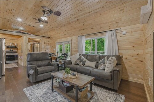 Romantic Luxury Lake Access Cabin w/ Hot Tub, Spacious Deck, and Pine walls