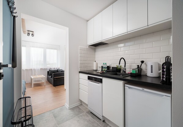 Fridge, stovetop, coffee/tea maker, toaster