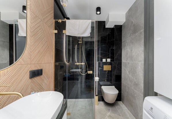 Shower, free toiletries, hair dryer, towels