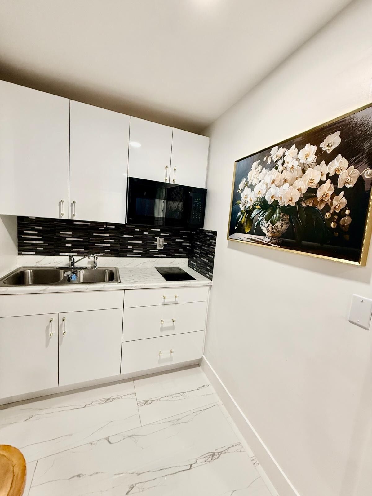 Fridge, microwave, coffee/tea maker, toaster