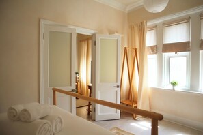 1 bedroom, desk, iron/ironing board, travel cot