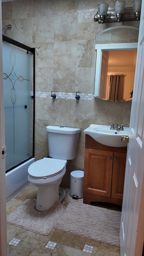 Hair dryer, towels, soap, toilet paper
