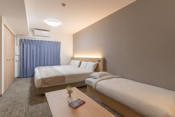 Quarto duplo luxo | Escrivaninha, Wi-Fi de cortesia, roupa de cama