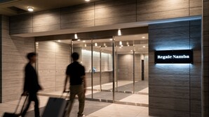 A hotel entrance with a sign reading "Regale Namba". - Regale Namba (Osaka)