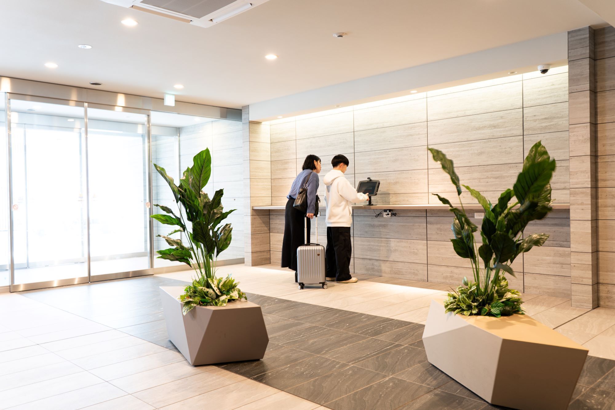 Check-in/check-out kiosk