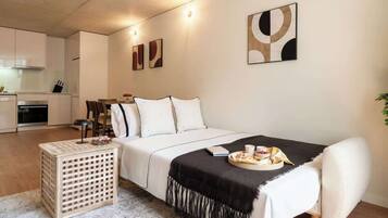 1 habitación, tabla de planchar con plancha, cuna de viaje y wifi