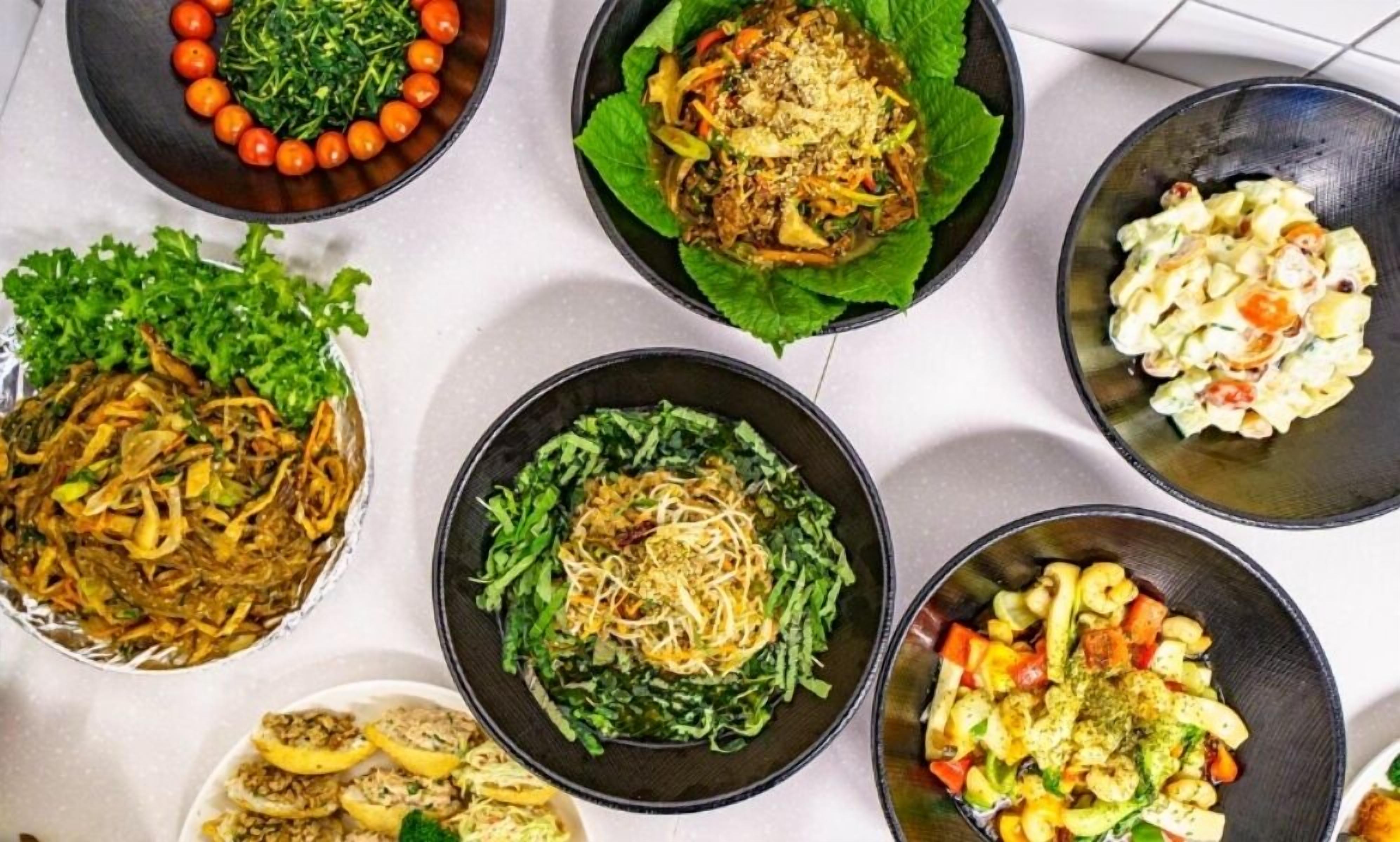 A variety of dishes arranged on a table.