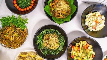 A variety of dishes arranged on a table.