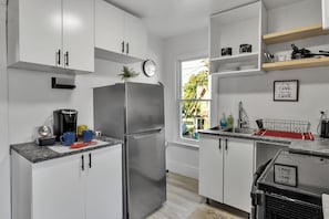 Fridge, microwave, coffee/tea maker, toaster