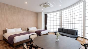 Habitación Deluxe con 2 camas individuales | Escritorio, wifi gratis, ropa de cama