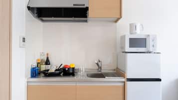 Superior Twin kamer | Privékeuken | Een koelkast/vriezer, een magnetron, een kookplaat, een waterkoker