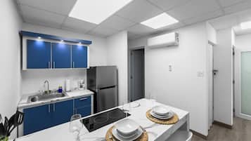 Fridge, microwave, stovetop, coffee/tea maker