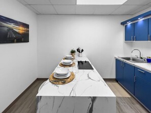 Fridge, microwave, stovetop, coffee/tea maker