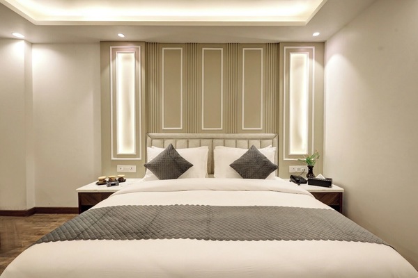 Premium bedding, desk, laptop workspace, iron/ironing board