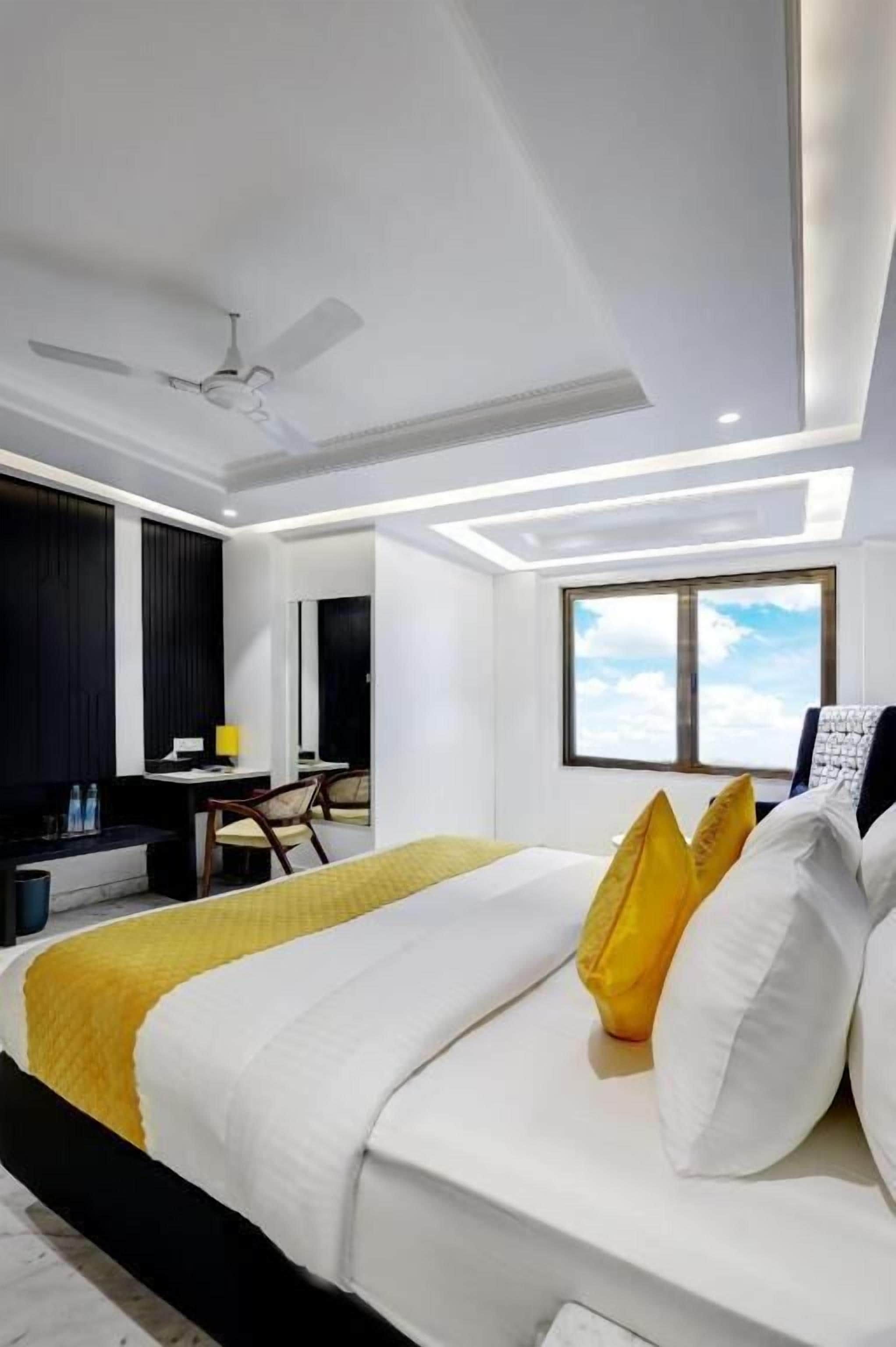 Presidential Studio Suite | Premium bedding, desk, laptop workspace, iron/ironing board