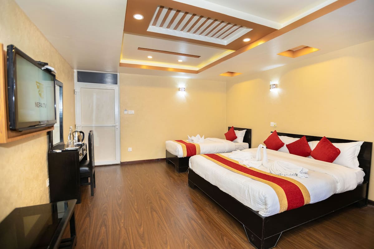Deluxe Triple Room | Laptop workspace, iron/ironing board, free WiFi