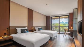 ألحفة محشوة بالريش وعناصر مجانية داخل الميني بار وخزنة داخل الغرفة